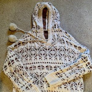 Pol hooded sweater.  Super warm. Off white with muted multi-color knit lining.